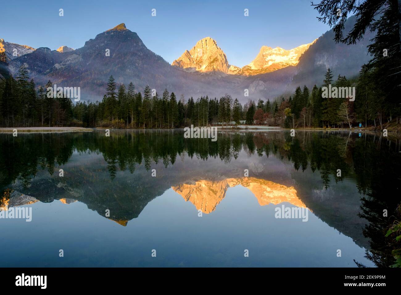 Schiederweiher lake at sunrise with Spitzmauer and Grosser Priel mountains in background Stock Photo