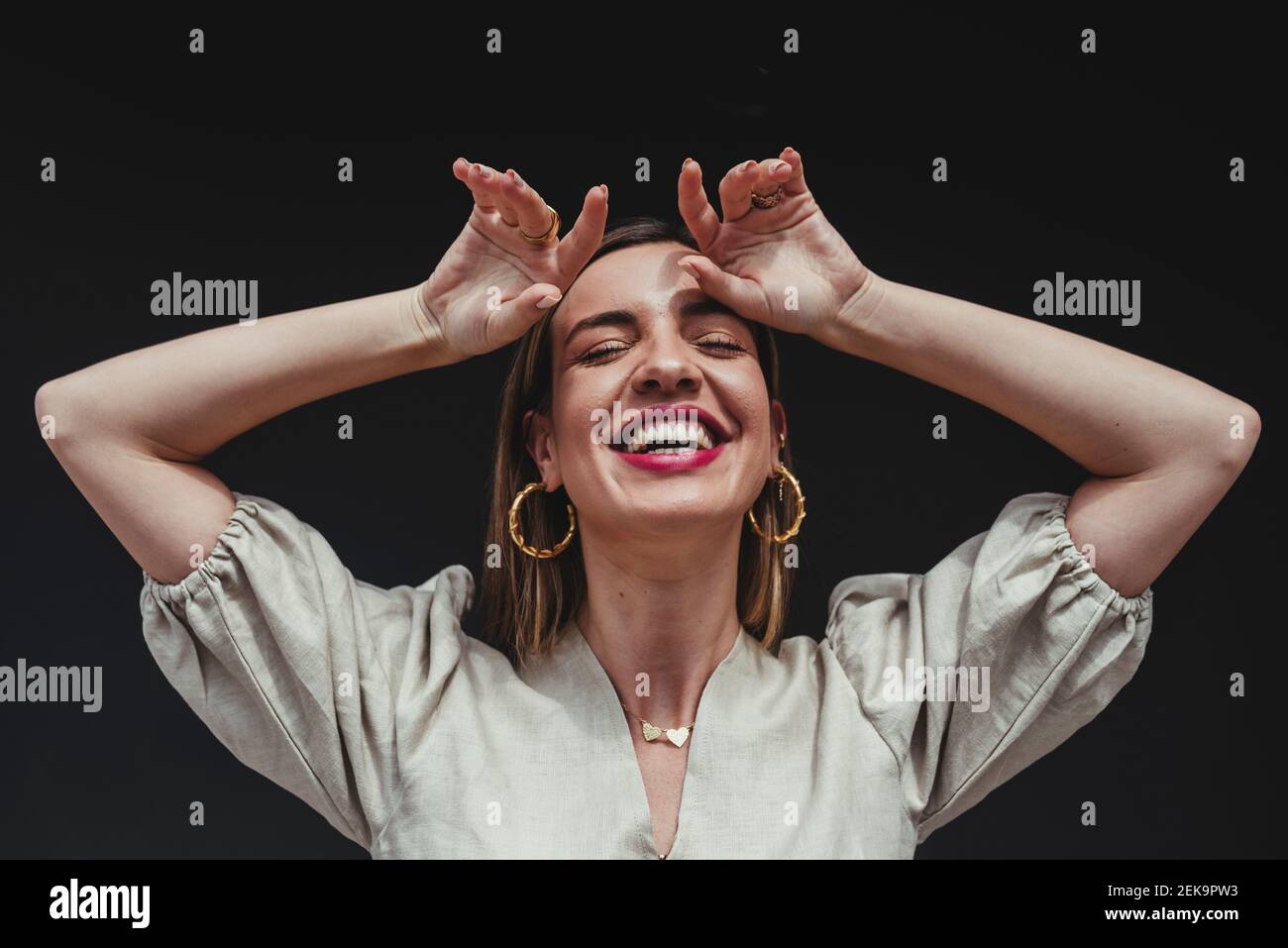 Woman arms up black hi-res stock photography and images - Alamy