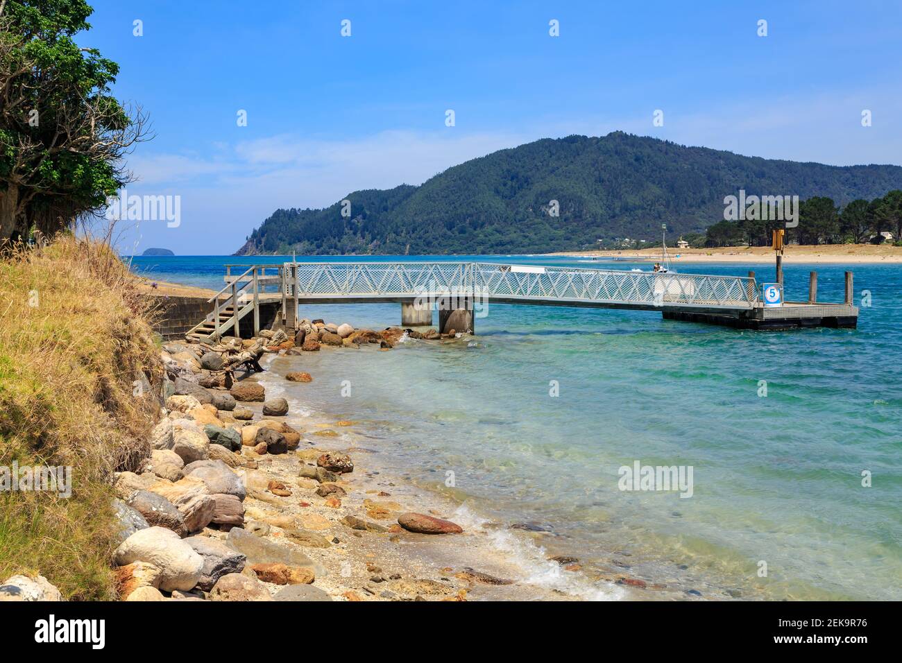 A pier on Tairua Harbour on the sunny Coromandel Peninsula, New Zealand