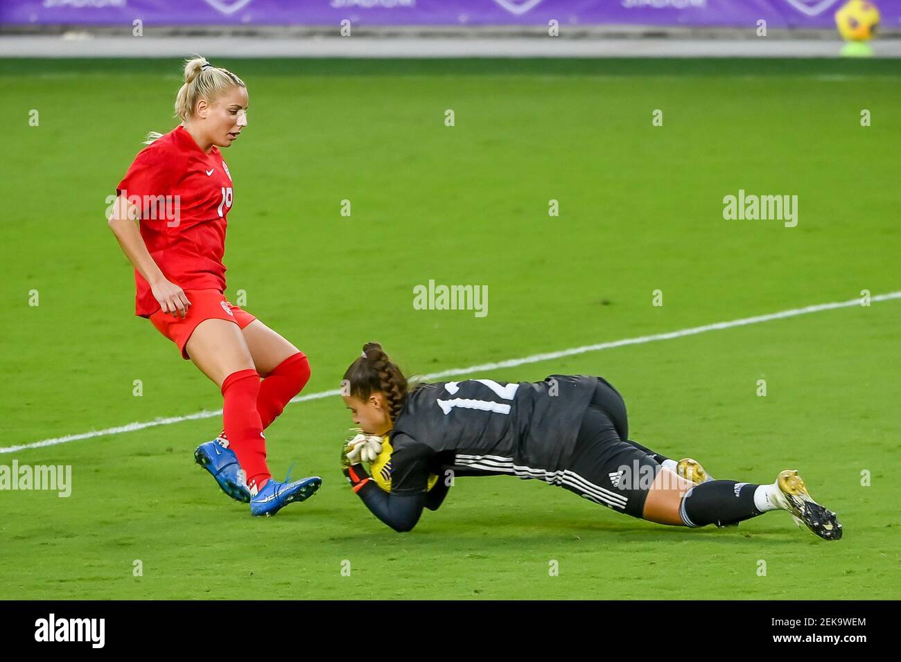 Orlando, United States. 21st Feb, 2021. Goalkeeper Laurina Oliveros (#12 Argentina) defending the goal during the SheBelieves Cup International Womens match between Argentina and Canada at Exploria Stadium in Orlando, Florida. Credit: SPP Sport Press Photo. /Alamy Live News Stock Photo