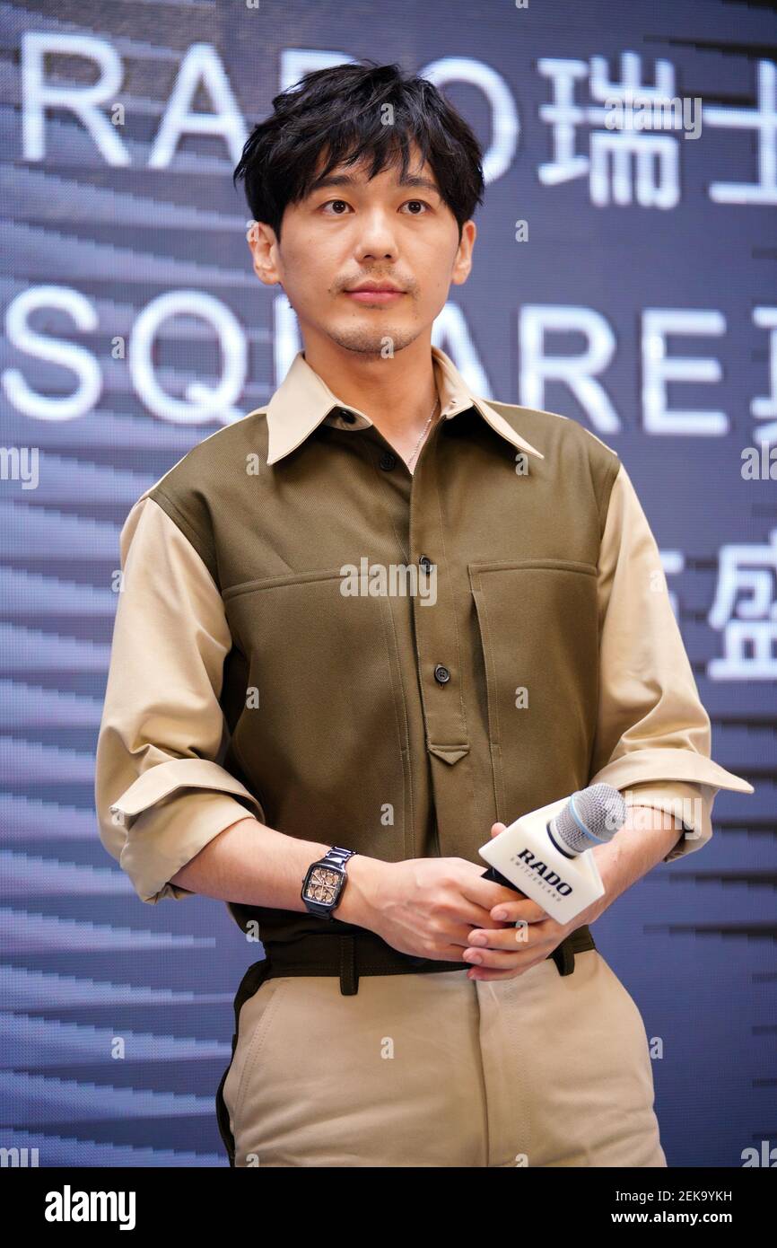 Chinese actor Bai Yu shows off elegance with a shirt on during a ...