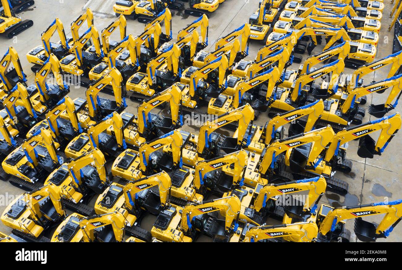 An aerial view of arrays of excavators at a factory of Chinese