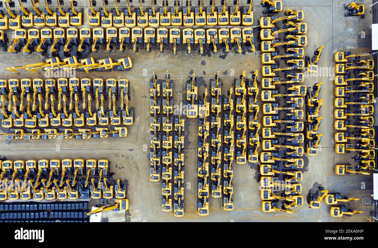 An aerial view of arrays of excavators at a factory of Chinese multinational heavy equipment manufacturing company Sany Heavy Industry Co., Ltd. in Lingang New Area of Shanghai, China, 18 July 2020. Stock Photo