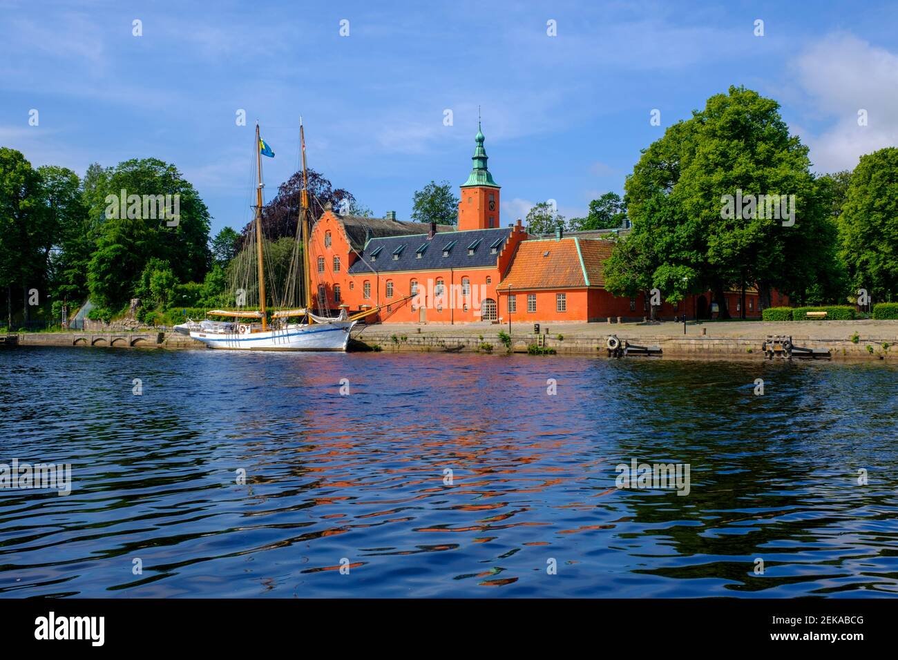 Sweden, Halland County, Halmstad, HSwMS Najaden moored in front of Halmstad Castle Stock Photo