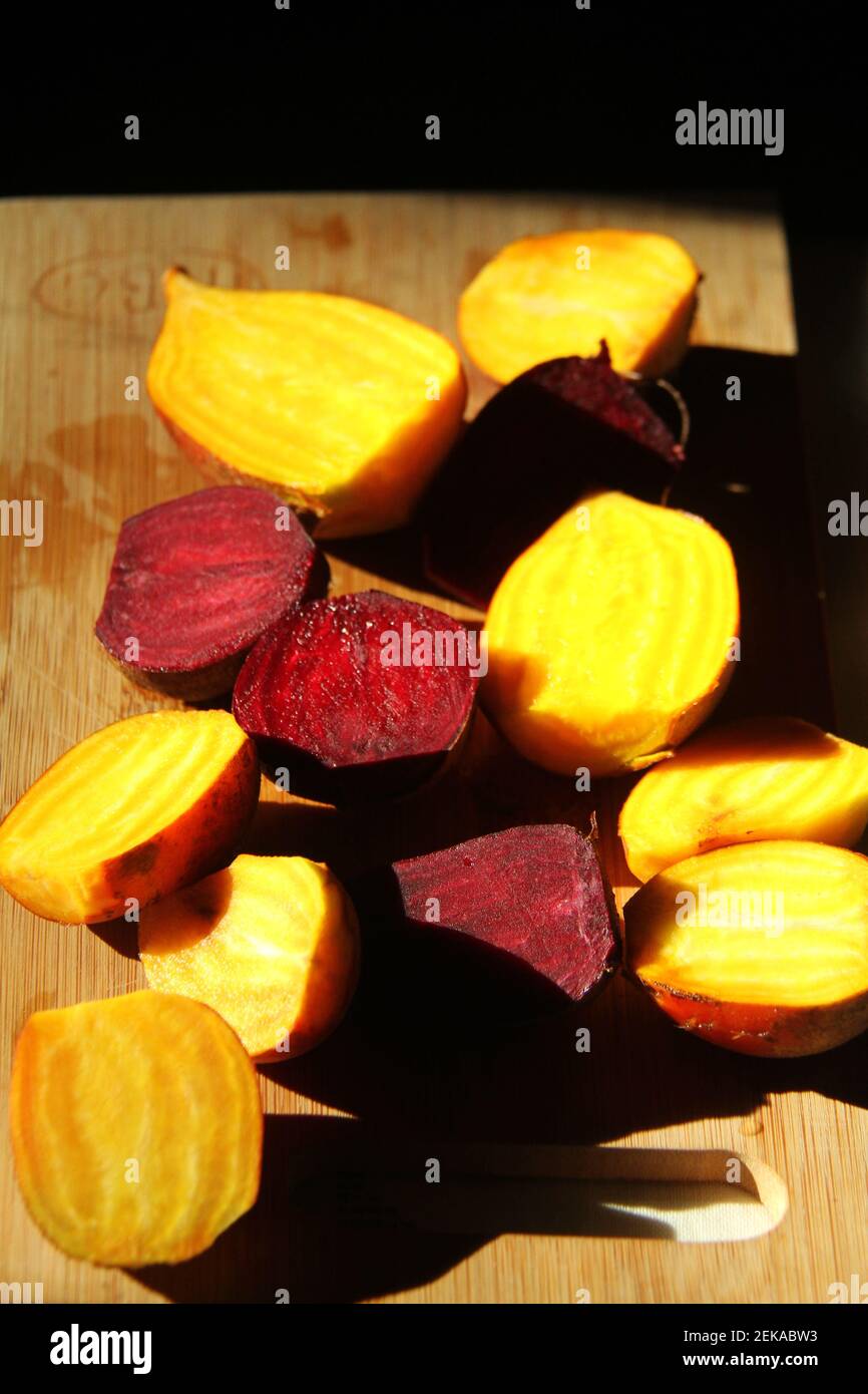 Raw beetroots cut in halves Stock Photo
