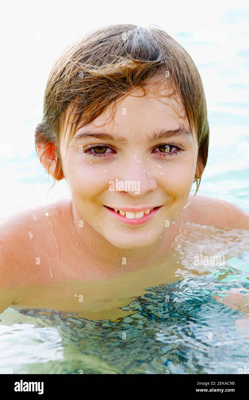 Portrait Of A Boy In A Swimming Pool Stock Photo Alamy