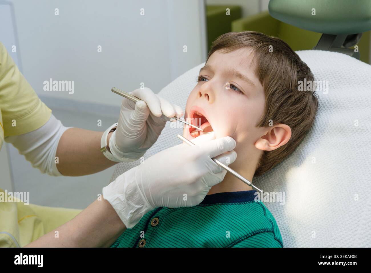 Dentist during treatment hires stock photography and images Alamy
