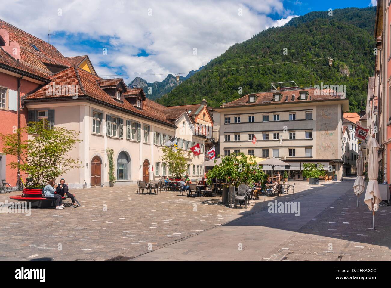 Kornplatz square with sidewalk restaurants and cafes in old town of Chur, Switzerland Stock Photo