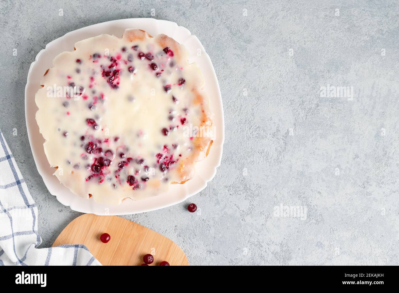 Homemade cranberry and sour cream pie in a glass baking dish. Top view, copy space Stock Photo