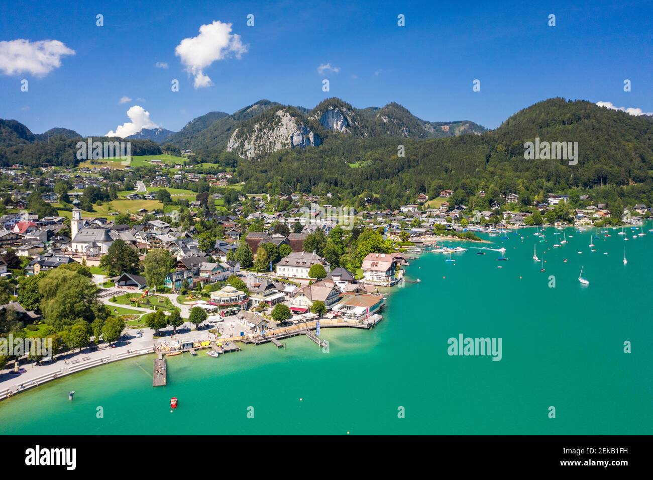 Austria, Salzburg, Sankt Gilgen, Aerial view of village on shore of Lake Wolfgang in summer Stock Photo