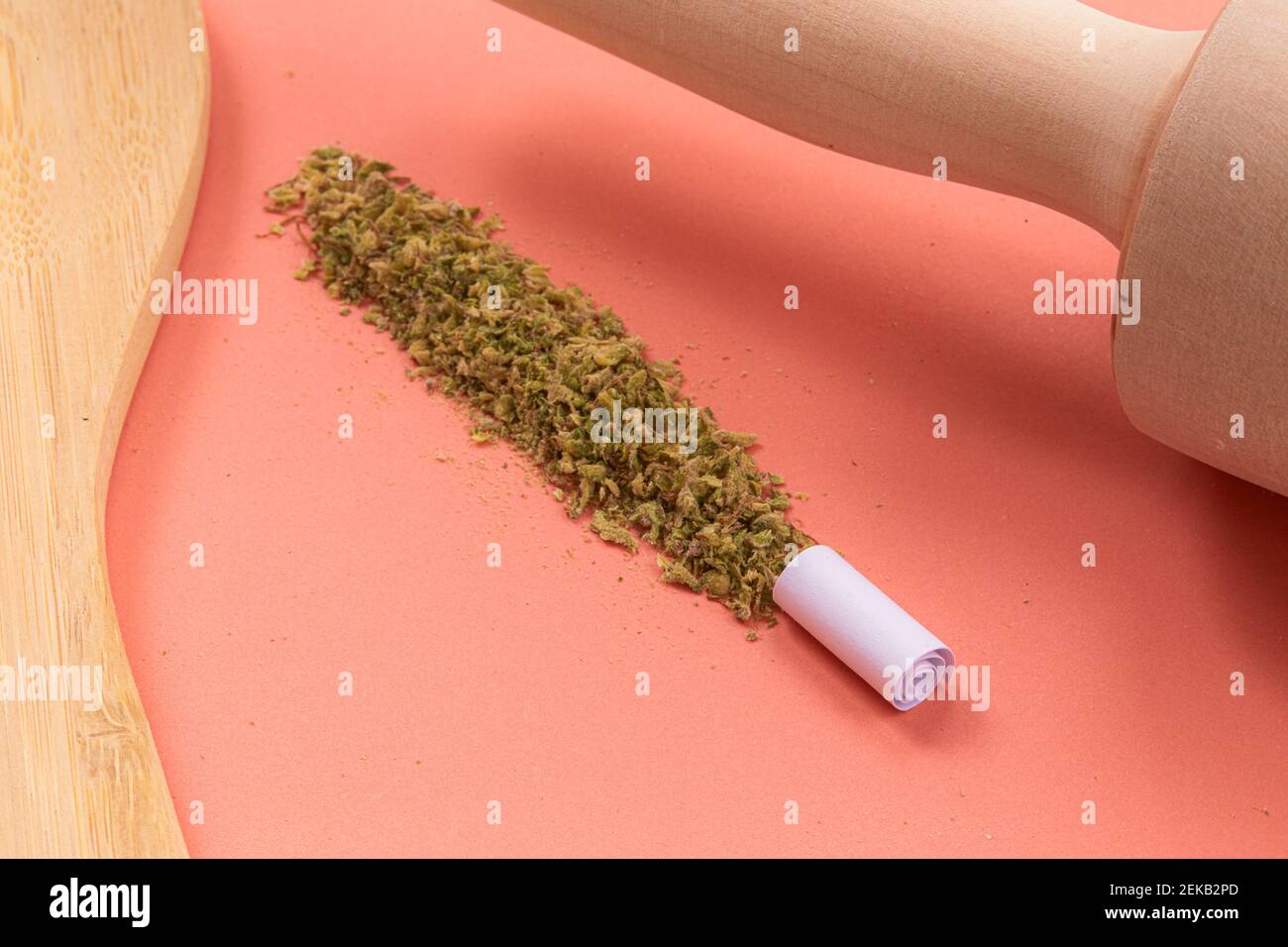 Cooking With Medical Cannabis Using Cooking Utensils On A Pink Back Ground Cannabis Leaf Marijuana Plant Marijuana Medical Marijuana Edibles Stock Photo Alamy