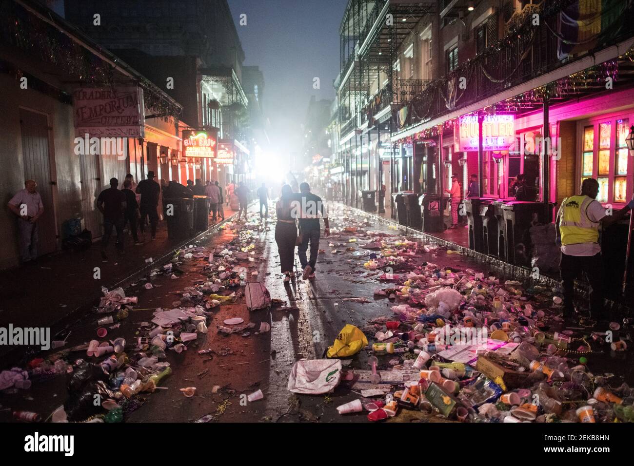 Trashfilled streets late night morning after Mardi Gras, New Orleans