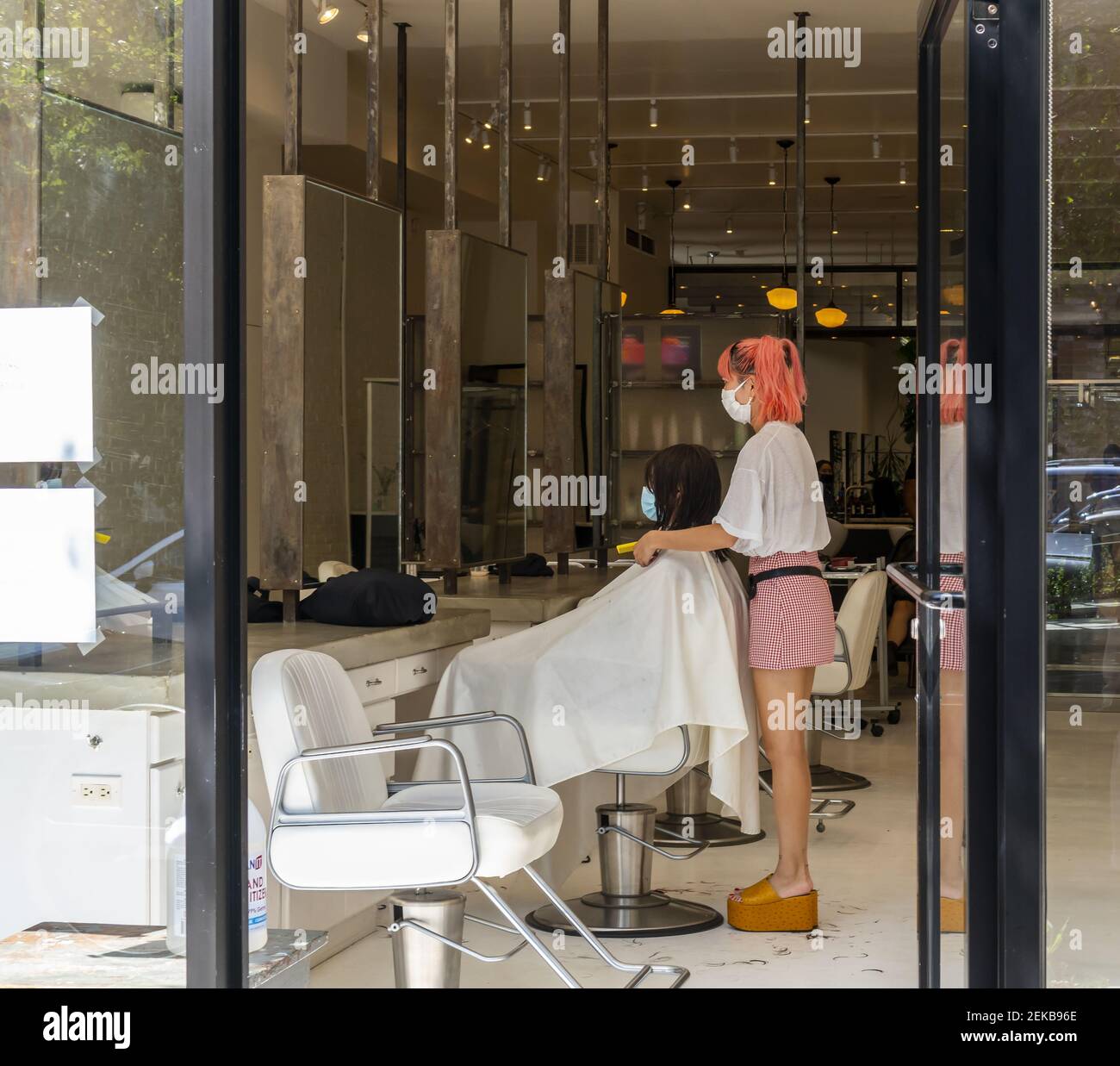 Properly masked hair salon in the Williamsburg neighborhood of Brooklyn