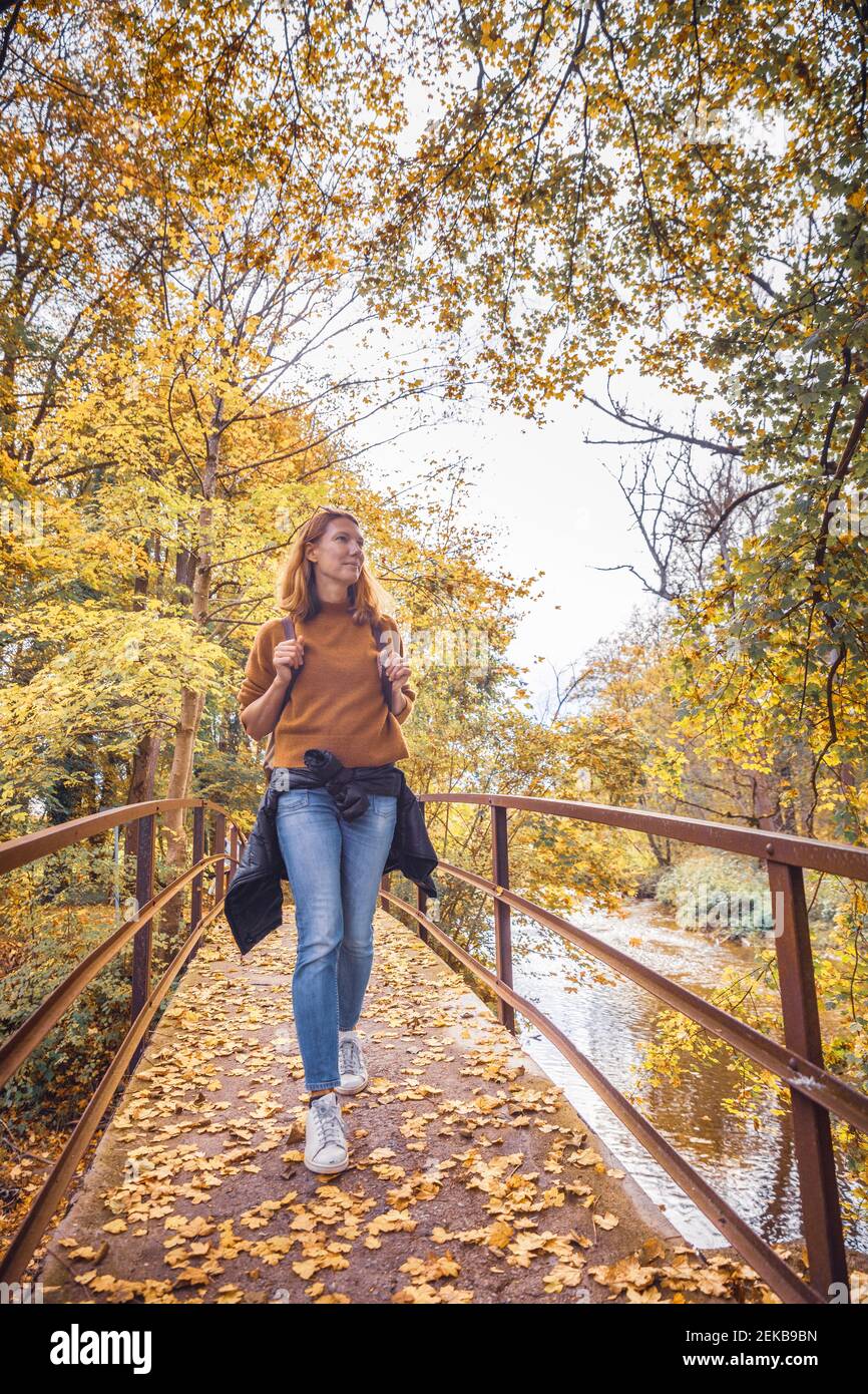 Mature woman walking forest hi-res stock photography and images - Alamy
