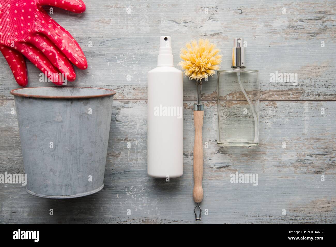 Cleaning utensils lying on wooden surface Stock Photo Alamy