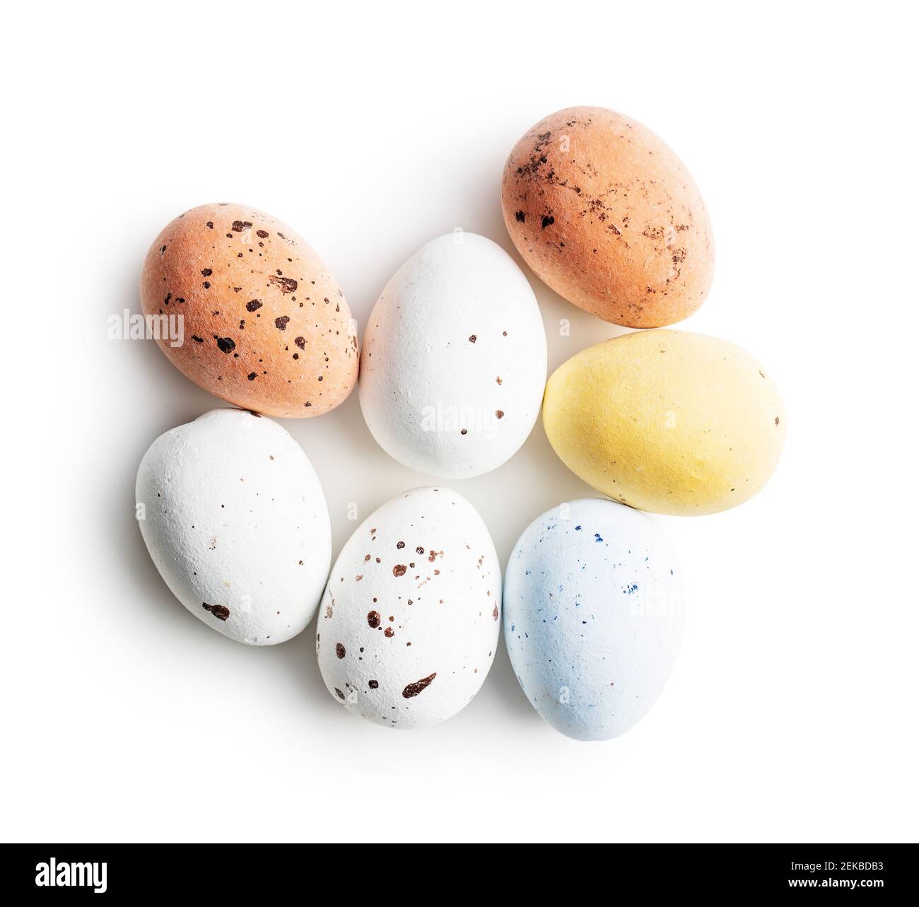 Chocolate easter eggs. Sweet candy eggs isolated on white background. Stock Photo