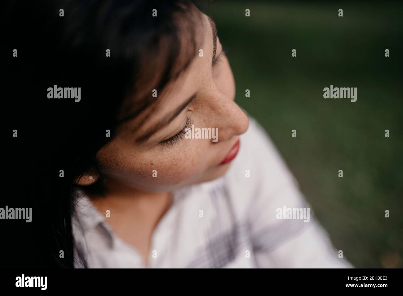 Beautiful woman with eyes closed Stock Photo