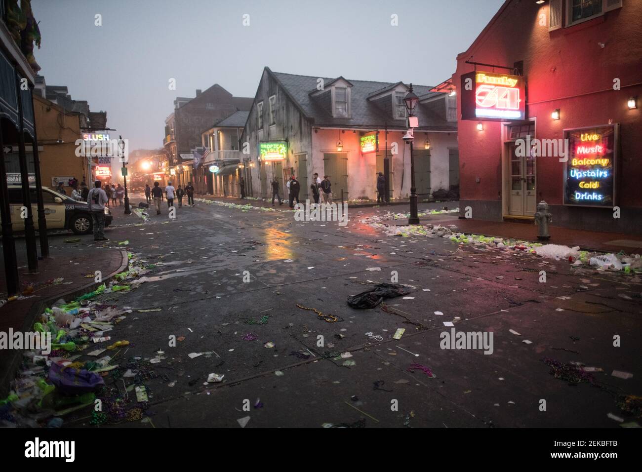 Trash-filled streets morning after Mardi Gras, New Orleans, Louisiana, USA. Stock Photo
