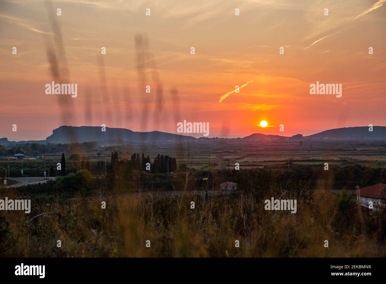Beautiful sunset over mountains at Ammoudia, Epirus, Greece Stock Photo