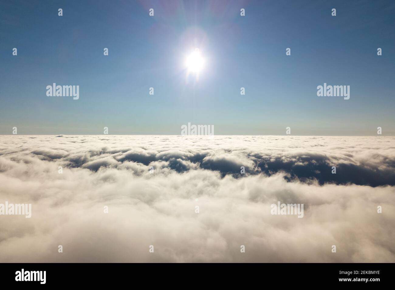 Aerial view from above of white puffy clouds Stock Photo - Alamy