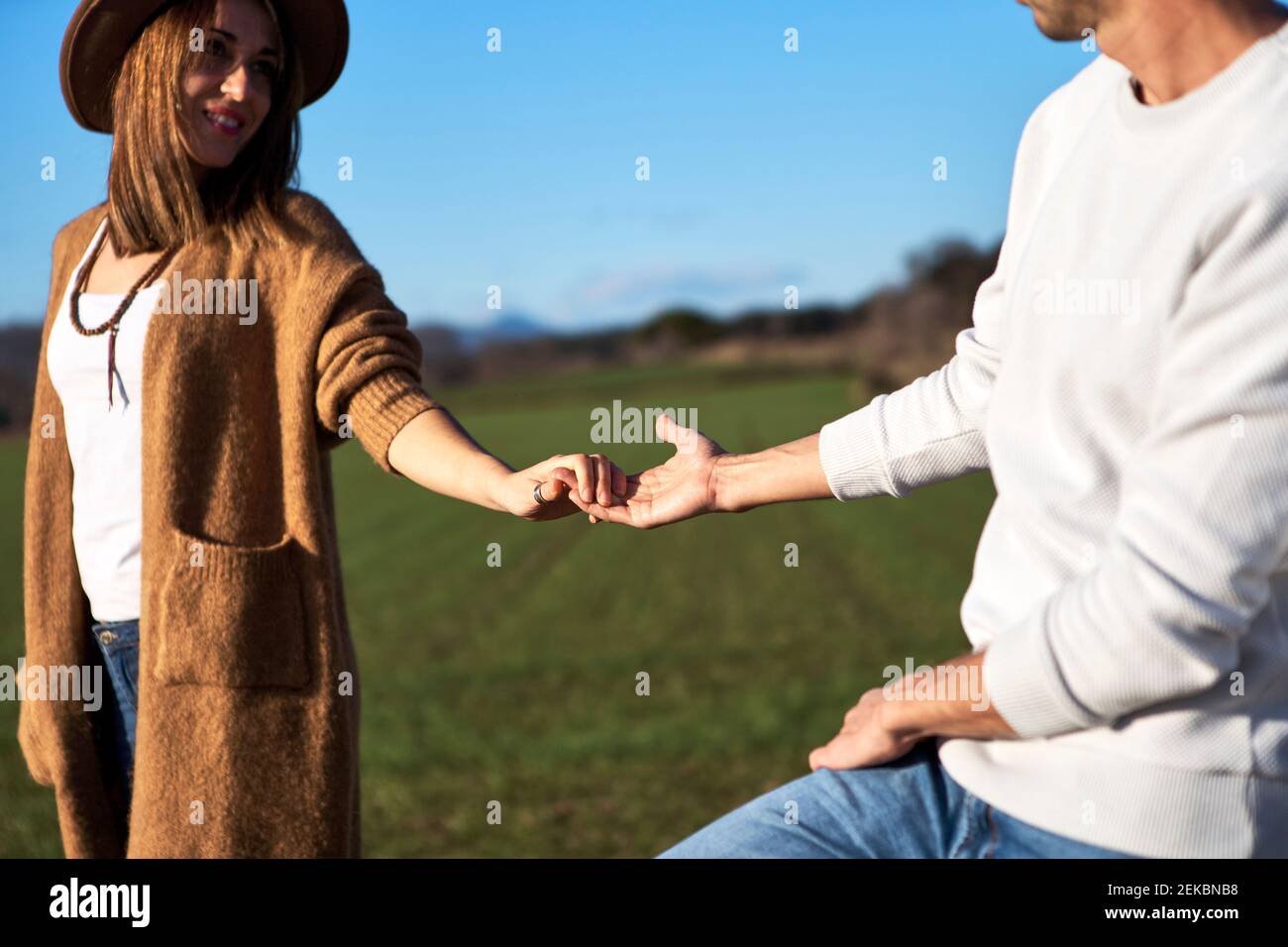 girlfriend and boyfriend holding hands