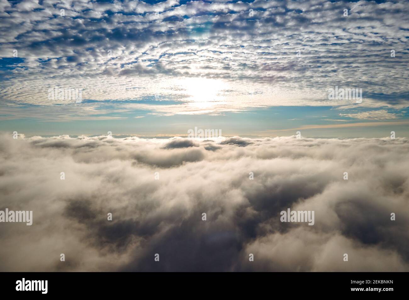 Aerial view from above of white puffy clouds in bright sunny day Stock ...