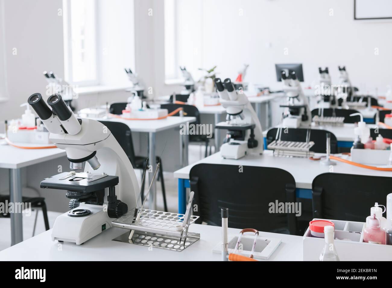 Microscopes in a science lab classroom Stock Photo