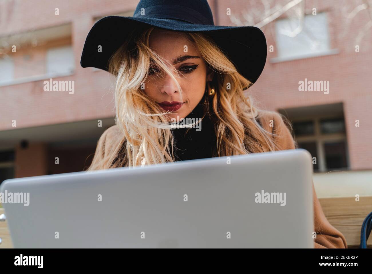Woman in hat using hi-res stock photography and images - Alamy