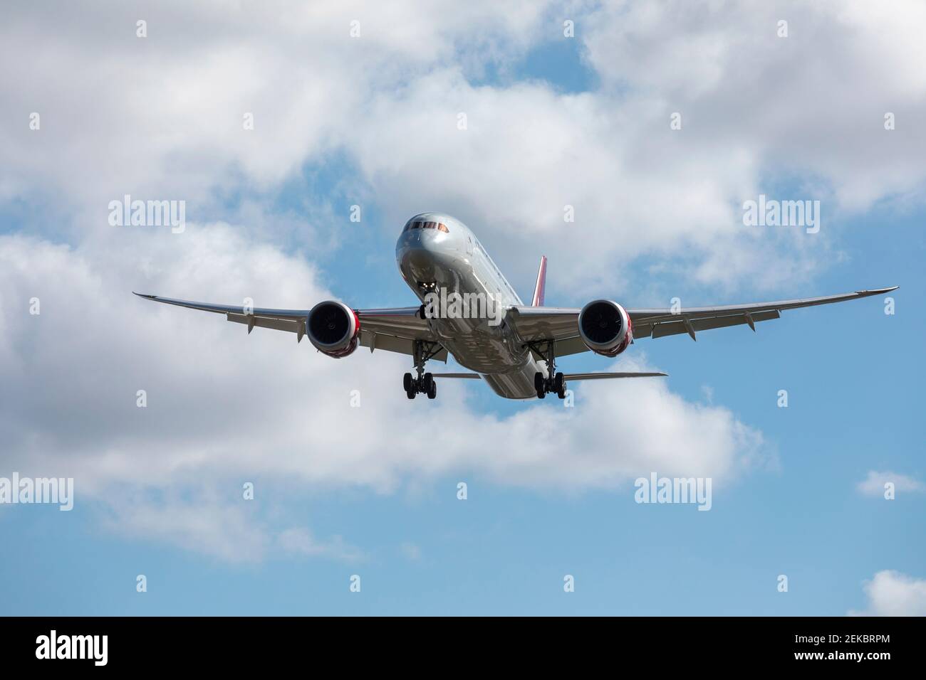 Commercial airplane preparing to land Stock Photo