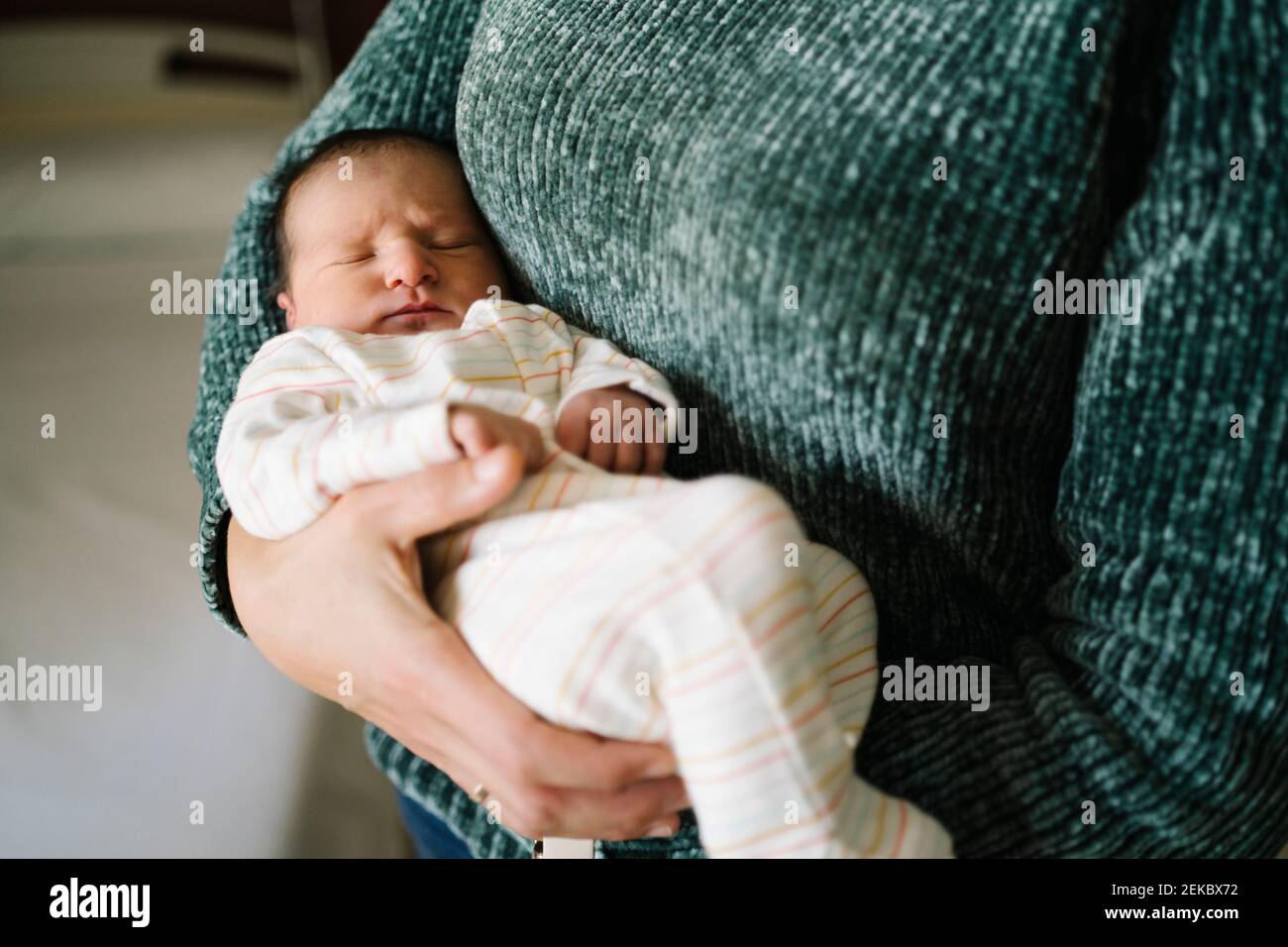 Babies Sleeping In Parents Arms