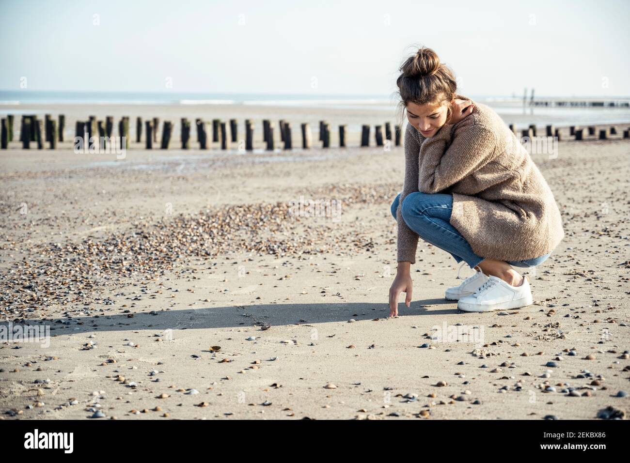 Squatting On The Beach Hi Res Stock Photography And Images Alamy