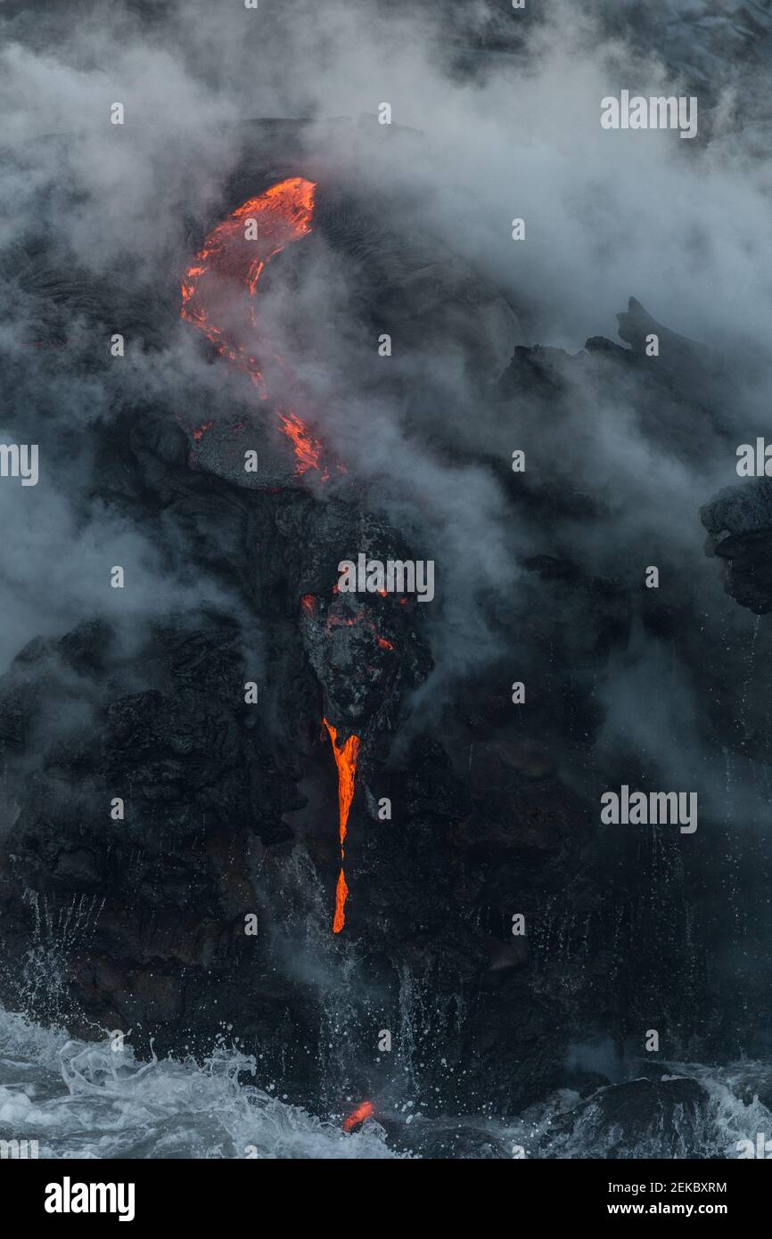 USA, Hawaii, HI, Lava river flowing into the Pacific Ocean from Kilauea