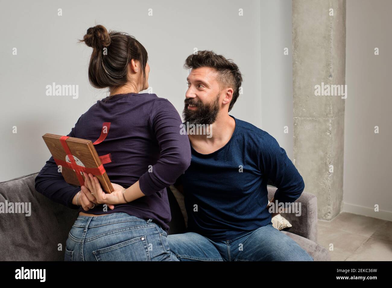 Adult couple exchanging gifts on Valentines Day Stock Photo