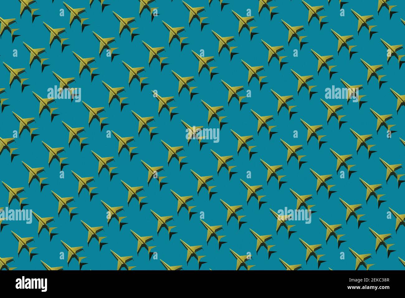 Pattern of yellow origami airplanes Stock Photo