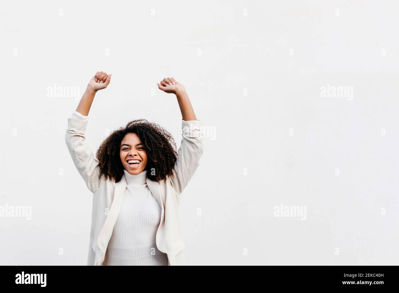 Happy afro woman screaming hi-res stock photography and images - Alamy