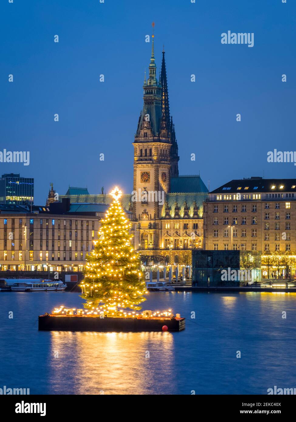 Germany, Hamburg, Inner Alster, Town hall, lake and city view with Christmas decorations Stock Photo