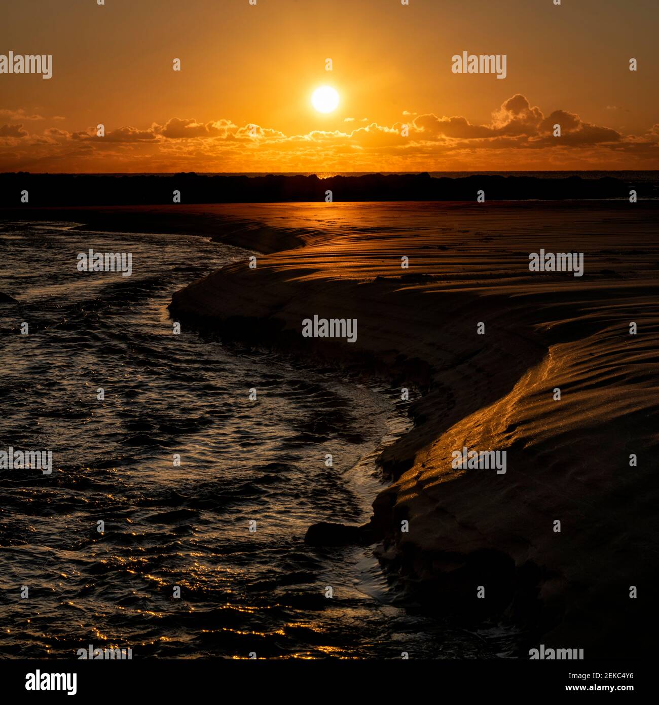 UK, Wales, Pembrokeshire, Freshwater West beach at sunset Stock Photo