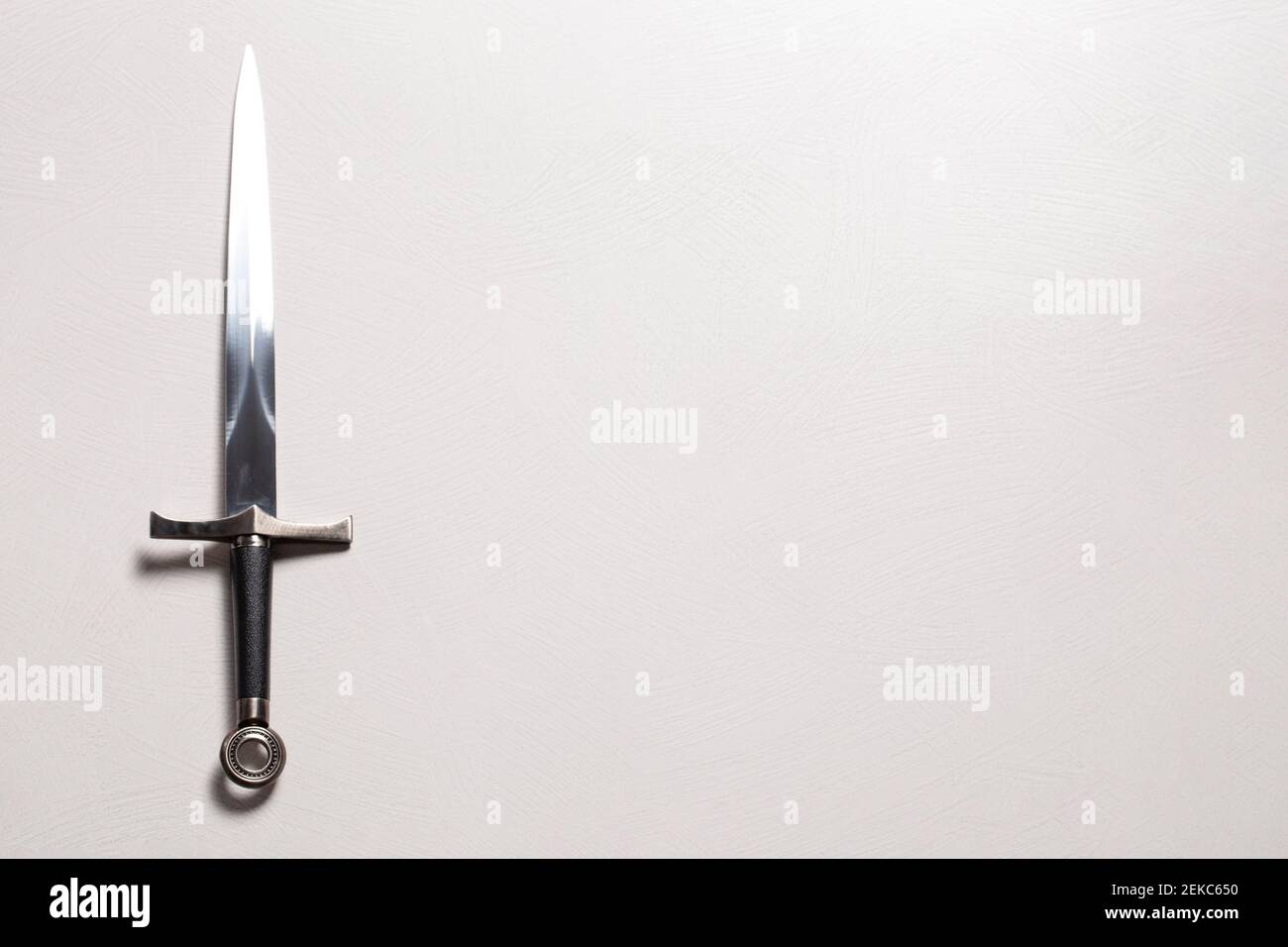 A Medieval Sword Isolated on a White Textured Background Stock Photo ...