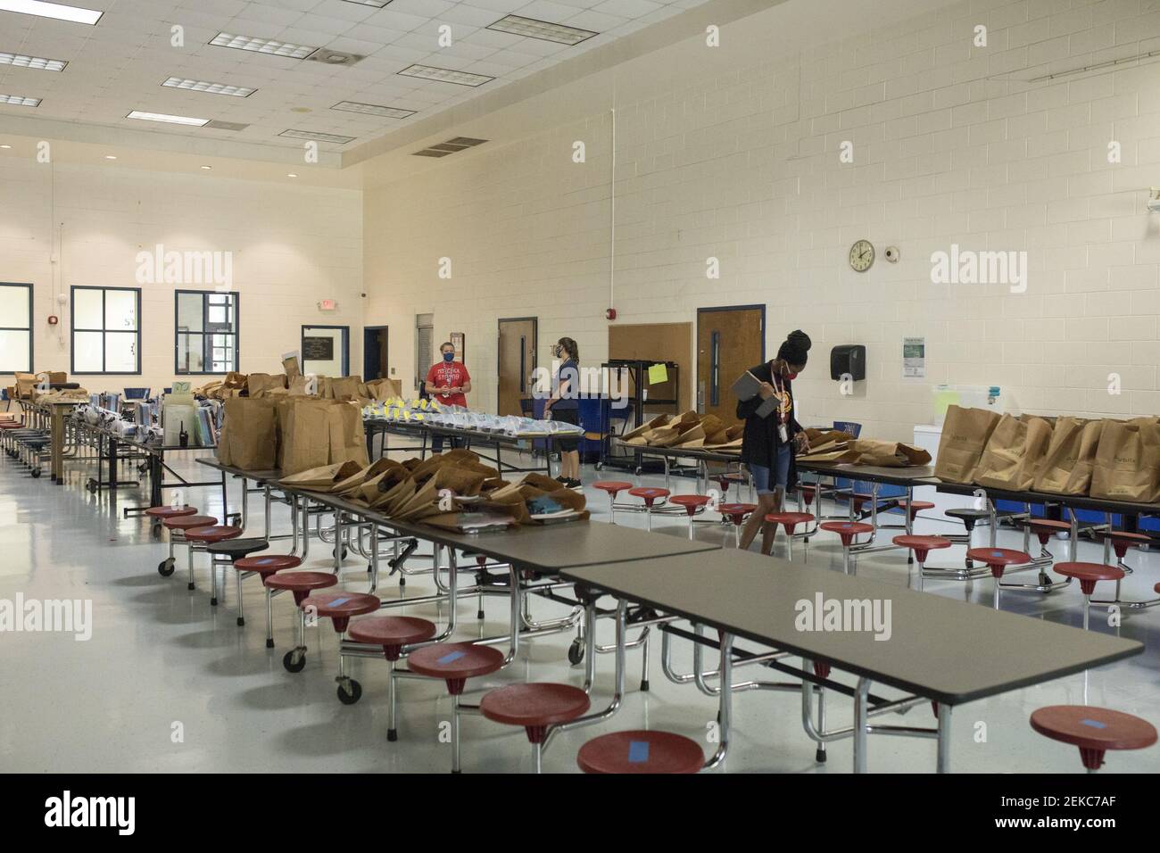 Teachers at Liberty Tech charter school prepare takehome bags