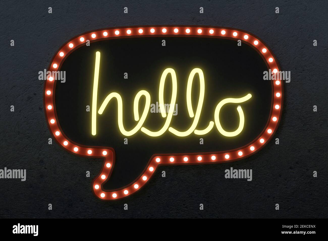 Illuminated speech bubble on black wall Stock Photo