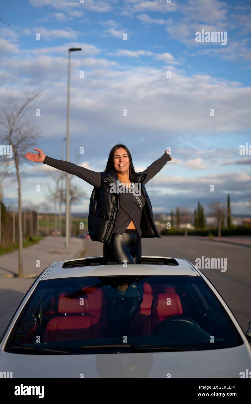 Standing on car roof hi res stock photography and images Alamy