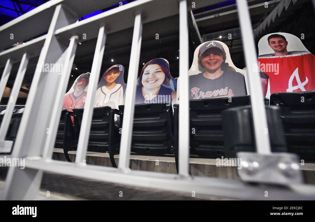 August 06, 2020 Cardboard cutouts of fans fill the seats of a MLB game