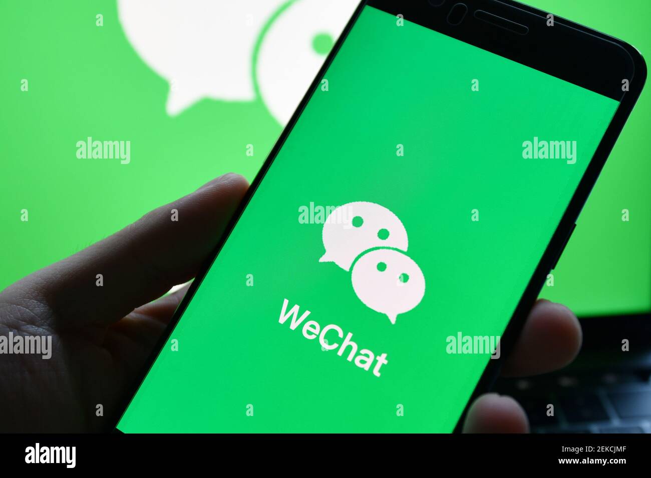 In this photo illustration, a WeChat logo seen displayed on a