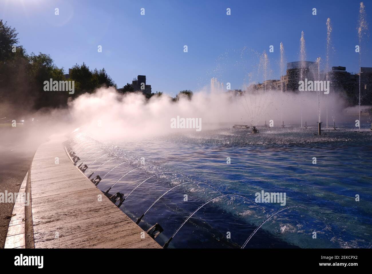 Amazing water fountains in the downtown of Bucharest City,  Union's Square - Piata unirii, Romania. Stock Photo