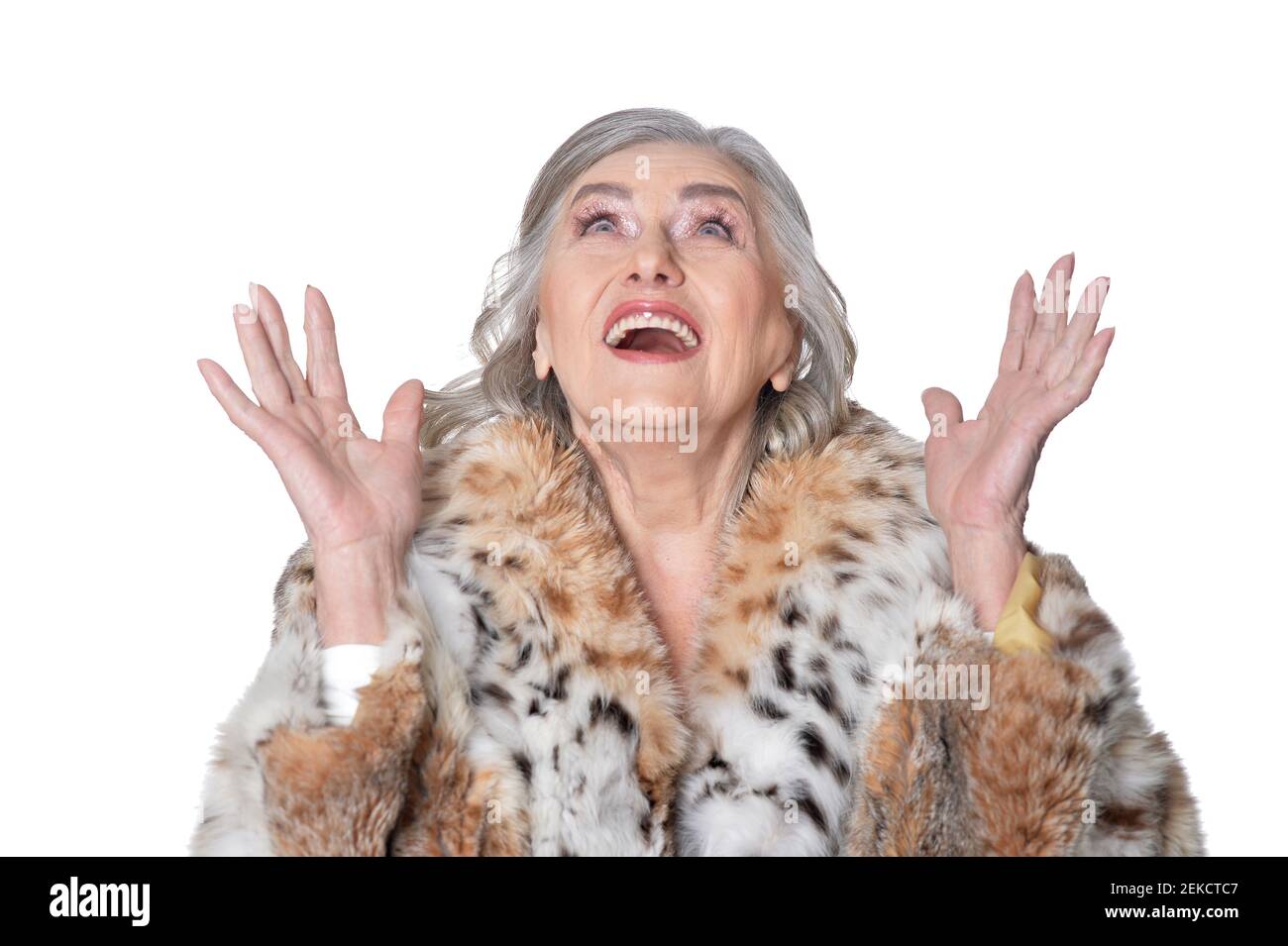 Portrait of happy beautiful senior woman in fur coat Stock Photo - Alamy