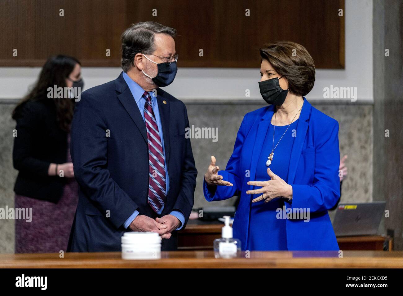 Washington, United States. 23rd Feb, 2021. Chairman Sen. Gary Peters., D-Mich., left, and Chairwoman Amy Klobuchar, D-Minn., right, speak before the start of a Senate Homeland Security and Governmental Affairs & Senate Rules and Administration joint hearing on Capitol Hill in Washington, Tuesday, February 23, 2021, to examine the January 6th attack on the Capitol. Pool Photo by Andrew Harnik/UPI Credit: UPI/Alamy Live News Stock Photo