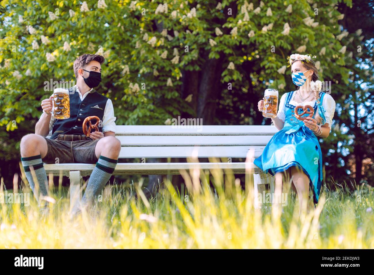 Social distancing in Bavaria at the beer garden Stock Photo