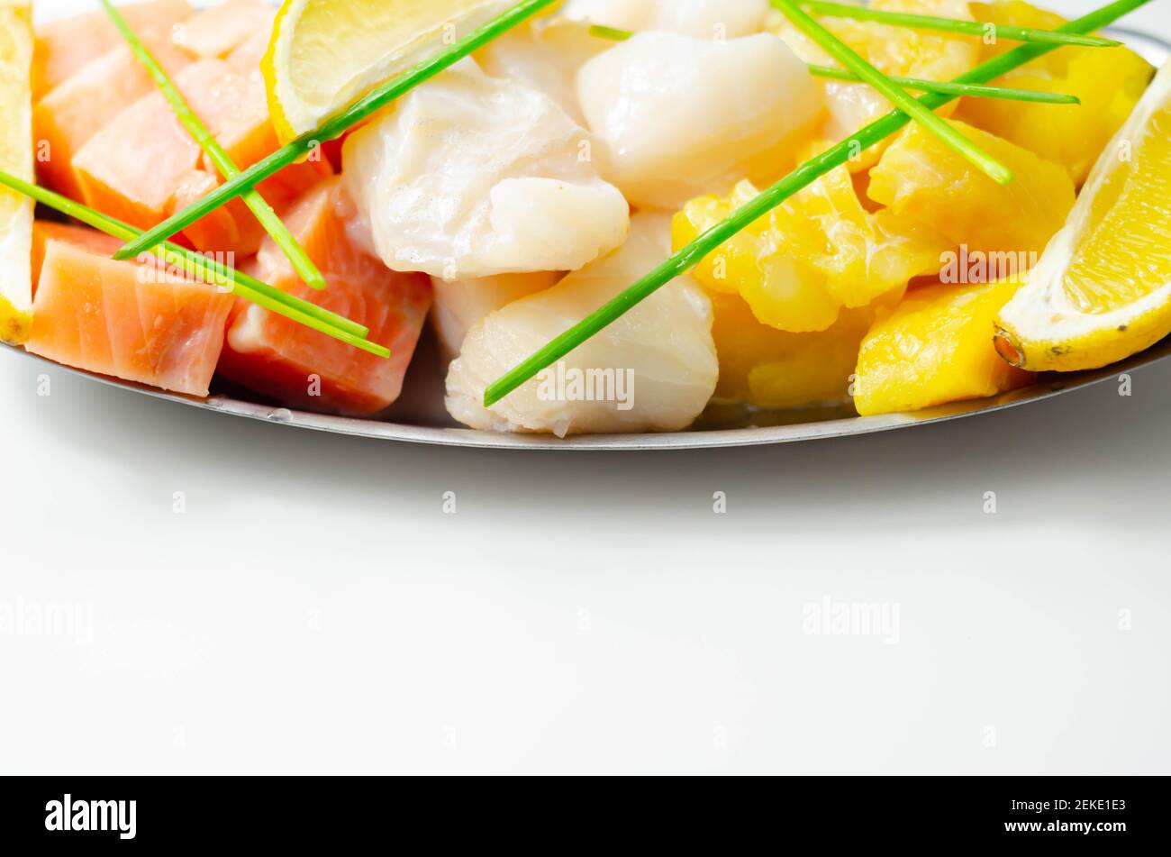 Fish pie mix, defrosted, skinless and boneless cod, dyed smoked haddock