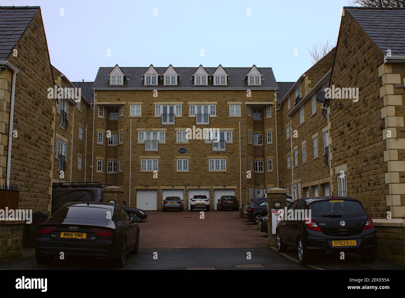 Holland House stone built apartments with garages underneath, home ownership concept Stock Photo