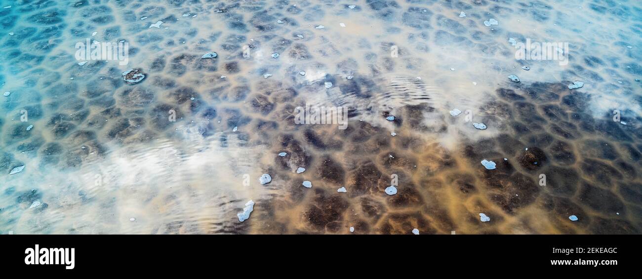 Playa surface covered by water, Panamint Valley, Death Valley National Park, California, USA Stock Photo